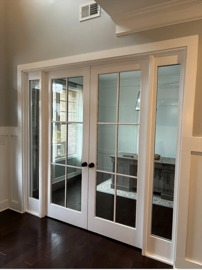 White interior French double doors with divided glass sidelights